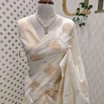 Kerala saree with small motif scattered all over body and with simple suttle side boarder