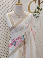 Kerala saree with large different colour flowers along with leaf motifs