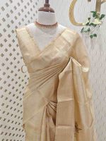 Kerala saree with rose like motif decorated with shining thread on the pallu and body