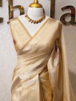 Kerala saree with large flower motif along with shining thread on the body with vertical lines