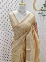 Kerala saree with suttle and contrast flower and leaf pattern on the body with doted vertical lines