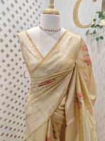 Kerala saree with sequins are scattered throughout the floral pattern