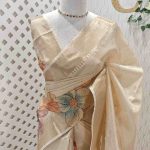 Kerala saree with suttle large flower print on the body and pallu