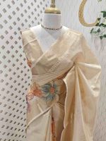 Kerala saree with suttle large flower print on the body and pallu