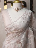 Net kota with grid  pattern on the body along with flower inside the scalloped boarder - Image 11