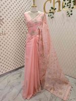Organsa with flower  motifs all over the body and flowing floral motifs on the boarder portion - Image 9