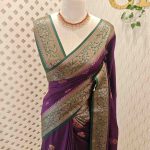 Semi Tussar Banarasi with flower buttas on the body and contrast intertwined floral border