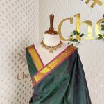 Kanjeevaram with plain body and contrast border with golden zari pattern