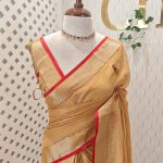 Linen saree with the features intricate, colorful floral embroidery work along the  pallu