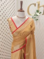Linen saree with the features intricate, colorful floral embroidery work along the  pallu