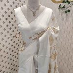Linen saree with plant like applique work design and wide plain border