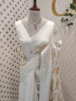 Linen saree with plant like applique work design and wide plain border
