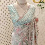 Organza with turkish floral work all over the body with wide embroidered net border