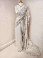 Organza with turkish floral work and sequins spreading on the body and heavy embroidered border - Image 3