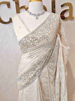 Organza with turkish floral work and sequins spreading on the body and heavy embroidered border