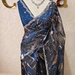 Organza with uneven turkish strips design with sequins spreading