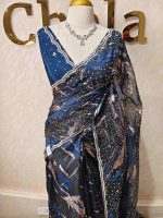 Organza with uneven turkish strips design with sequins spreading