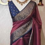 Soft silk with plain body and  leaf motif inside triangle shape motifs on the boarder