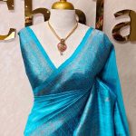 Tussar Banarasi with flower buttas on the body and big leaf design self border