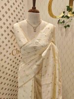 Tissue silk saree with petal like applique work design and buttas scattering