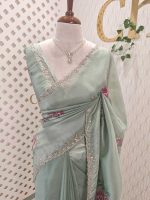 Tissue saree with contrast bundle like floral motifs and small leafs along with sequins and cut beads