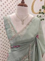 Tissue saree with contrast bundle like floral motifs and small leafs along with sequins and cut beads - Image 2