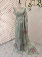 Tissue saree with contrast bundle like floral motifs and small leafs along with sequins and cut beads - Image 4