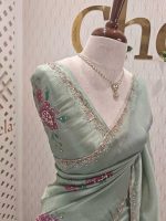 Tissue saree with contrast bundle like floral motifs and small leafs along with sequins and cut beads - Image 3