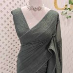 Chanderi with thread embroidery motifs allover the body and floral, lace detailed border