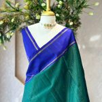 Kanjeevaram saree with fine zari checks on the body and contrast plan border with zari stripes