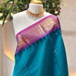 Kanjee cotton with   temple-inspired woven zari border featuring elephant and paisley motifs