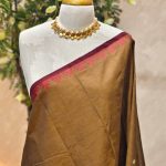 Kanjee cotton with temple-inspired woven zari border with floral paisley detailing