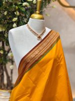 Kanjee cotton with small buttas allover the body and contrast traditional zari woven border with peacock motif - Image 2
