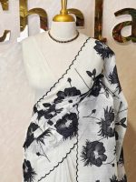Net kotta with big flower applique embroidery pattern allover the body.