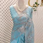 Organza with all over floral tread embroidery and zari line detailing