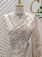 Organza with floral ikat-style embroidered pattern and double scalloped boarder - Image 8