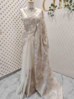 Organza with floral ikat-style embroidered pattern and double scalloped boarder - Image 9