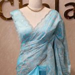 Organza with large floral embroidered motif all over the body