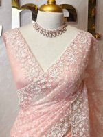 Organza with floral jaal design all over the body and heavy embroidered scalloped border - Image 2