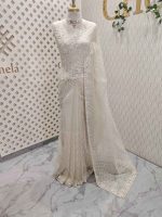 Organza with floral jaal design all over the body and heavy embroidered scalloped border - Image 9