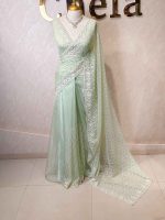 Organza with floral jaal design all over the body and heavy embroidered scalloped border - Image 6