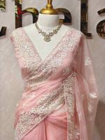 Organza with heavy embroidered and sequins cutwork border and minimal floral buti motif all over the body - Image 8
