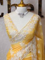 Organza with heavy embroidered and sequins cutwork border and minimal floral buti motif all over the body - Image 11
