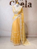 Organza with heavy embroidered and sequins cutwork border and minimal floral buti motif all over the body - Image 12