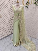 Organza with heavy floral sequins embroidered border and buti motifs all over the body - Image 3