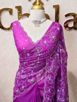 Organza with heavy tread embroidery all over the body and double scalloped border