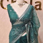 Organza with floral tread embroidery striped pattern and small buti all over the body