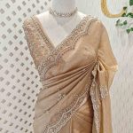 Organza with heavy stone  pearl sequence embroidered scallope border and buti motifs all over the body