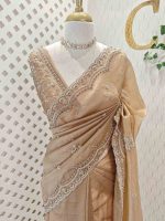 Organza with heavy stone  pearl sequence embroidered scallope border and buti motifs all over the body