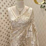 Organza with golden,off white turkish work and scallop border
